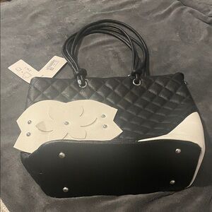 Elegant Black and White Vegan Leather Quilted Handbag
